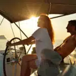 Wealthy Woman sailing in the yacht