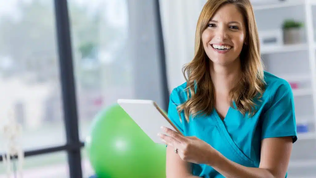 image of a physical therapist - an example of a job that could pay a salary of $35k per year.